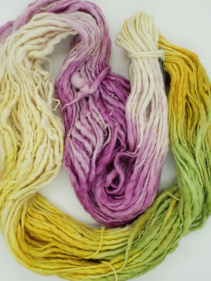 Slubby - SNOW CROCUS -  Merino/Blue Face Leicester - Hand Dyed Textured Yarn Thick and Thin  -  Variegated Shades